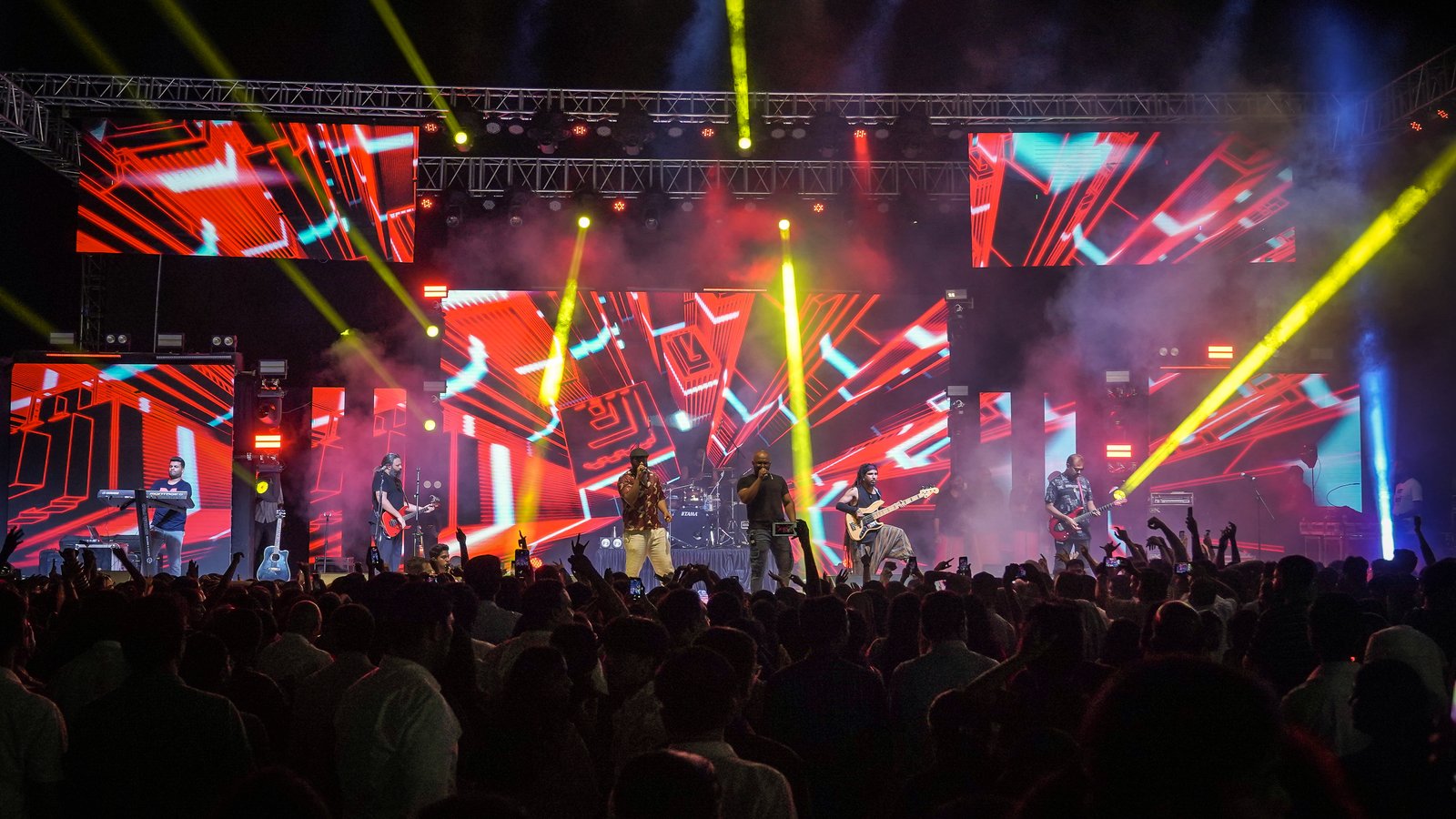 Kerala band Thaikkudam Bridge performing on stage at Rider Mania in Goa