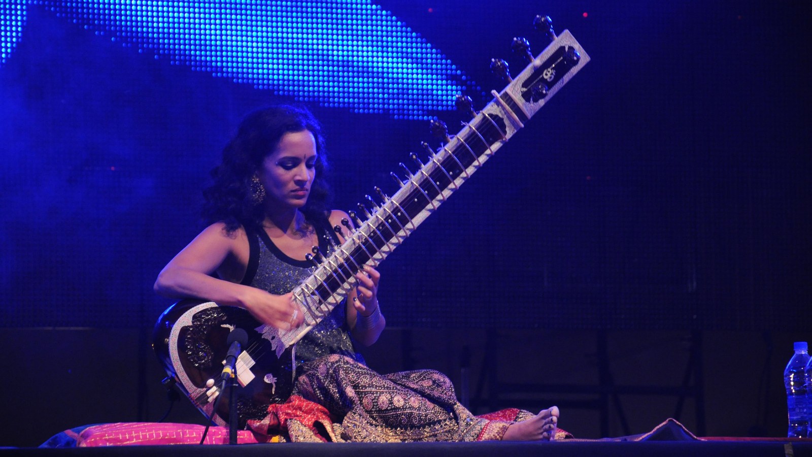 Anoushka Shankar playing sitar on stage at NH7 Weekender