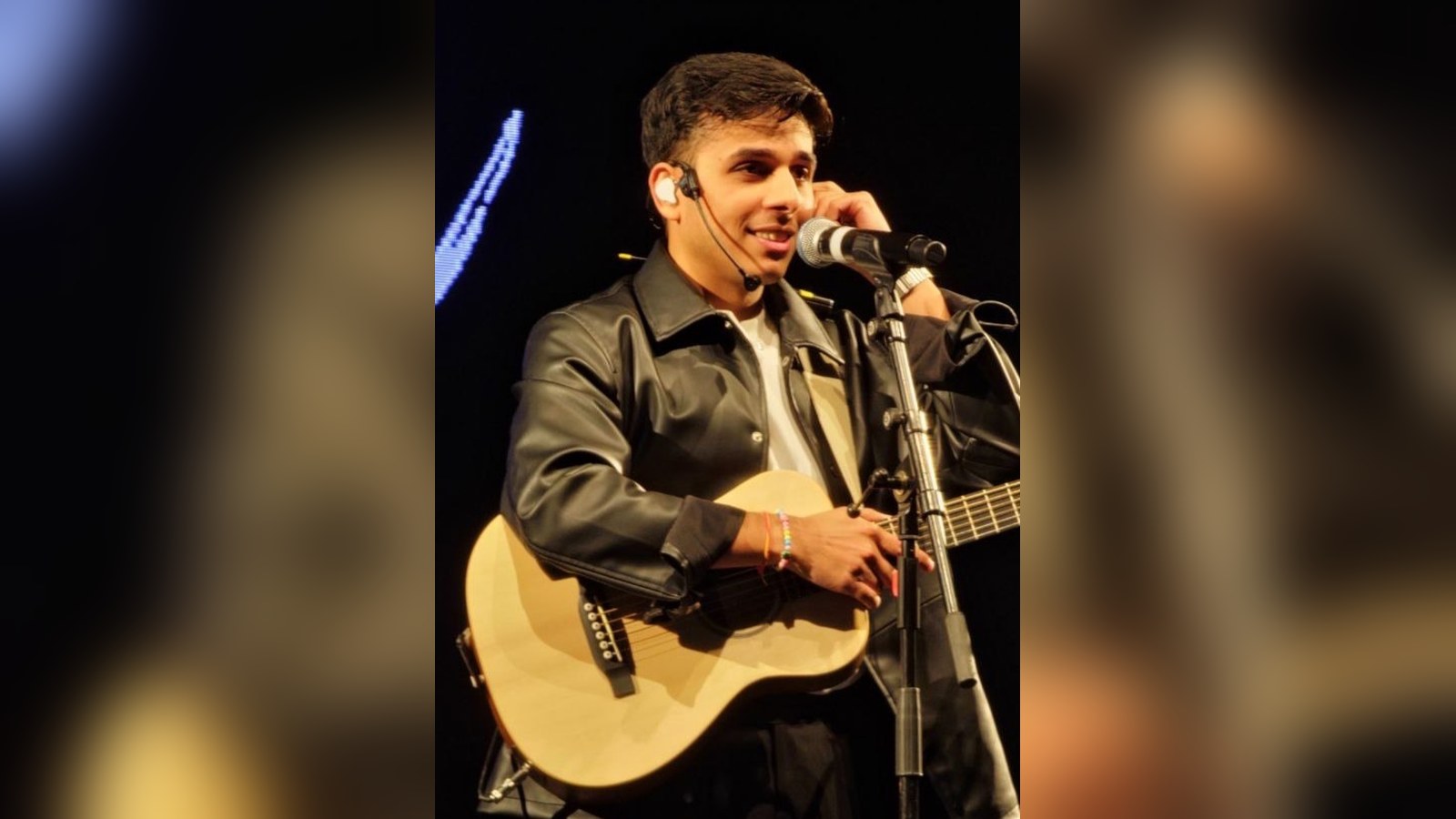 Anuv Jain performing live with a guitar at his Ludhiana concert