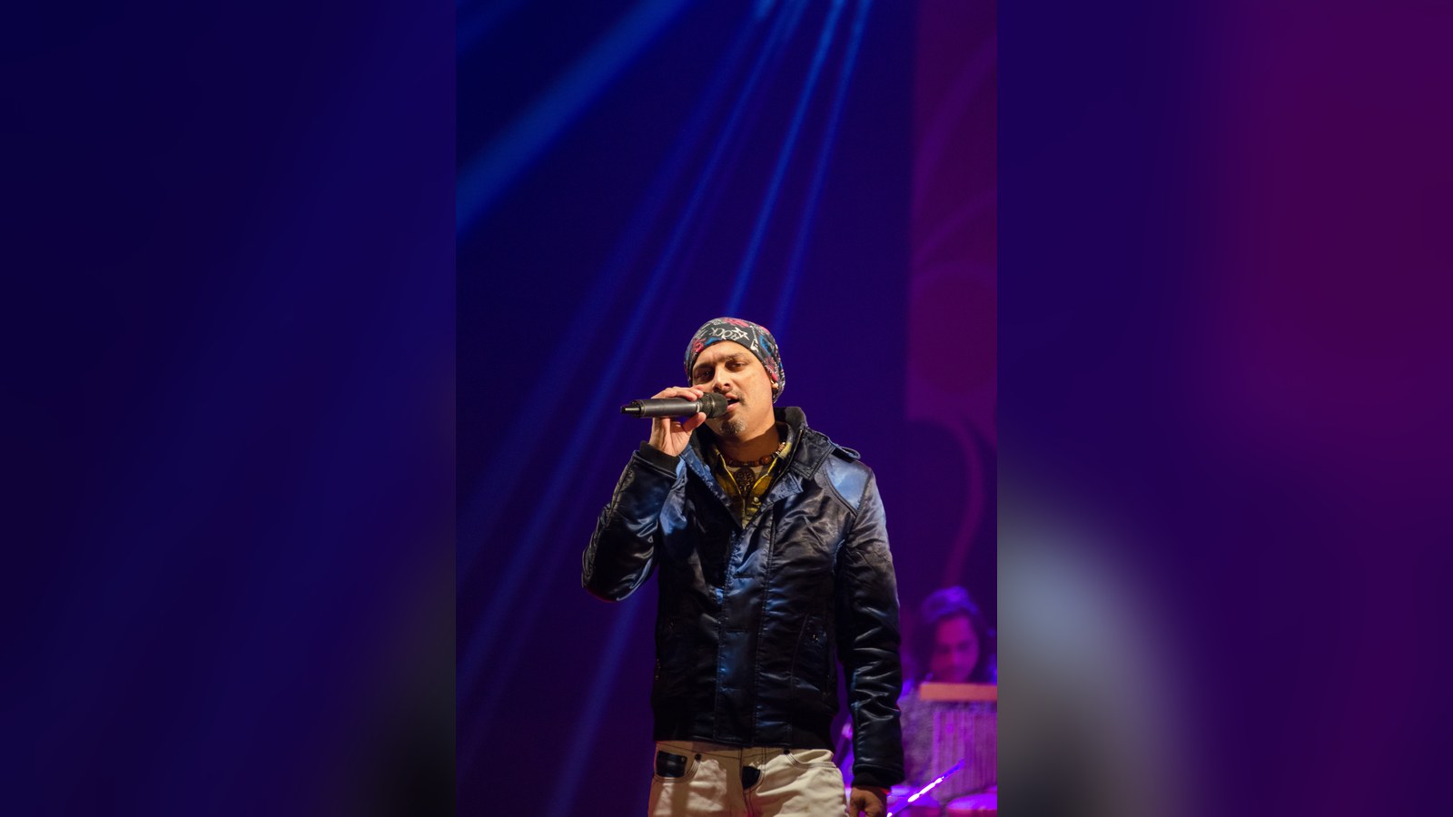 Zubeen Garg singing on stage at a concert in Guwahati in January 2016