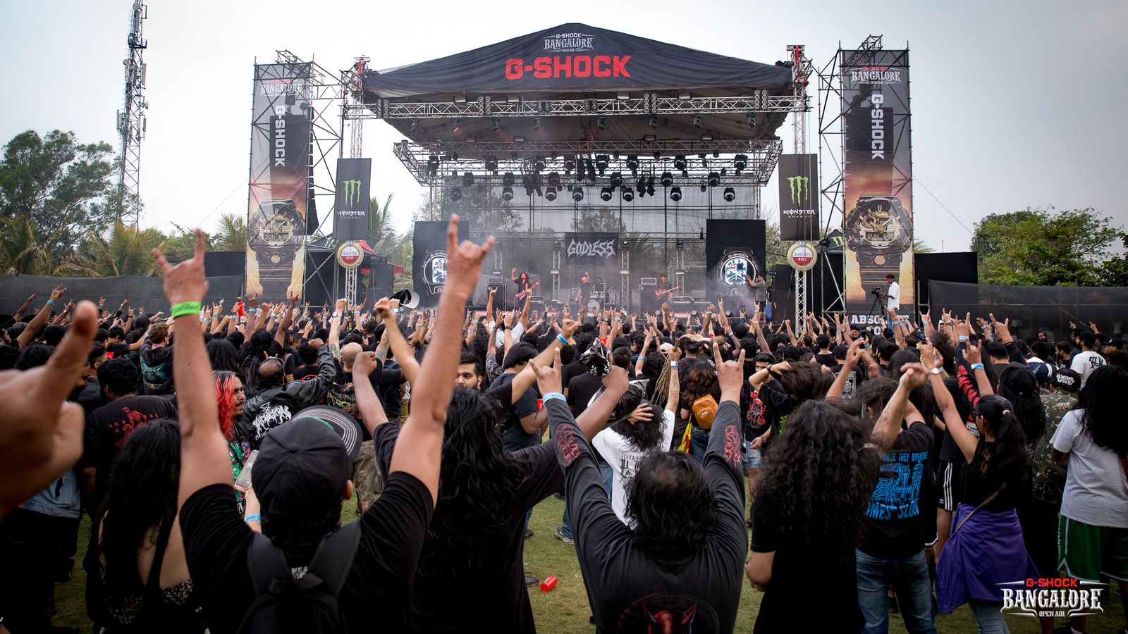 Fans raise horns in front of the G-Shock main stage as Godless play Bangalore Open Air 2019 in Bengaluru