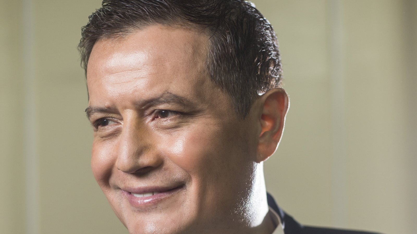 Neil Nongkynrih, founder of the Shillong Chamber Choir, smiling in a 2020 portrait
